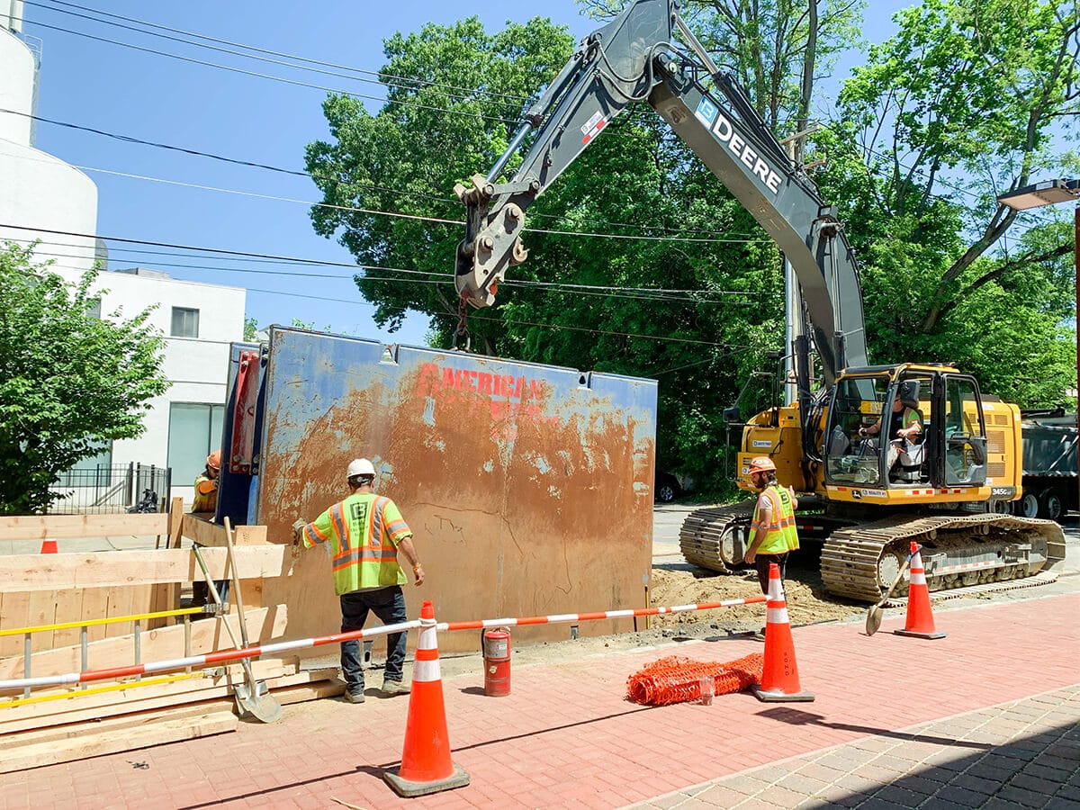Bancker crew working together on a utility installation