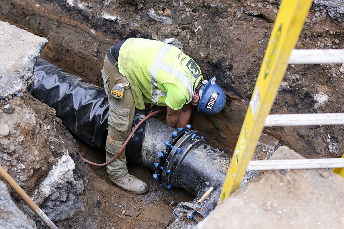 Bancker crew on an active jobsite wearing full PPE